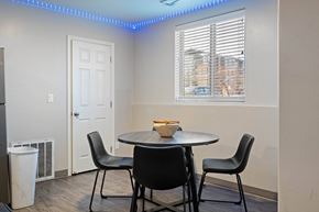 Saint George apartment for rent - A dining room with a round table and four chairs.