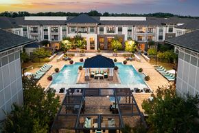 Alpharetta apartment for rent - The Juncture Apartments aerial view of one resort-style pool and surrounding sundeck