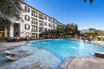 Luxurious resort-style pool with tanning ledge