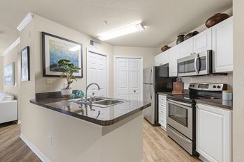 Premium interior upgraded homes with stainless steel appliances and granite-inspired countertops available