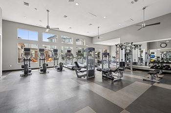 24-Hour fitness center with the latest cardio and weight training equipment