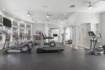 Innovative fitness center with yoga, strength, cardio and spinning rooms