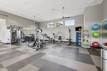 24-Hour fitness center with the latest cardio and weight training equipment