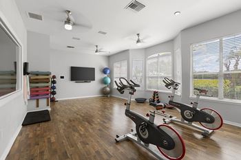 Innovative fitness center with yoga, strength, cardio and spinning rooms