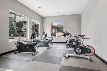 24-Hour fitness center with the latest cardio and weight training equipment