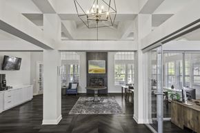 Pooler apartment for rent - A large, open living room with a high ceiling and a chandelier.