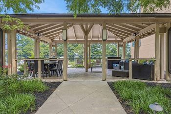 Large courtyard with seating, gazebo and outdoor grilling station
