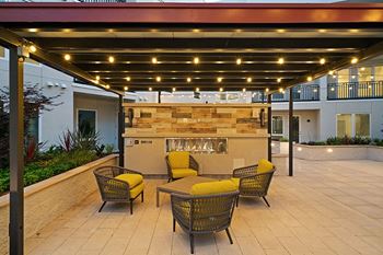 Courtyard deck with bbq pavilion and fireplace