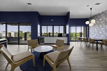 Top-floor sky lounge with panoramic views of nashville and indoor/outdoor space