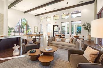 Chandler apartment for rent - A living room with a brown couch and a coffee table.