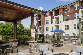 Outdoor kitchen cabana with grilling stations