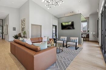 Lounge areas in clubhouse with cable/satellite tv
