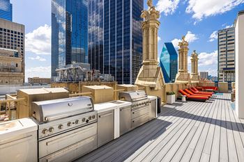 Outdoor kitchen with seating area