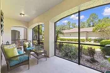 French doors to private screened patio/balcony