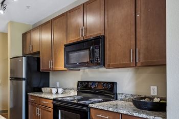 Custom 42-inch espresso-colored kitchen cabinetry