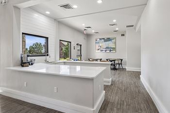 Clubhouse with lounge, fireplace and kitchen