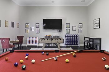 Billiard room and social lounge with large flat screen tvs