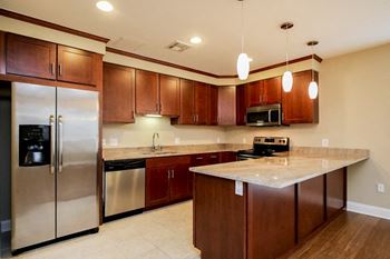 Efficient stainless steel appliances including microwaves