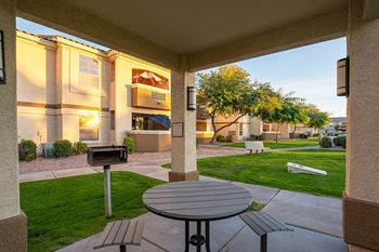 Bbq grill and covered outdoor lounge area