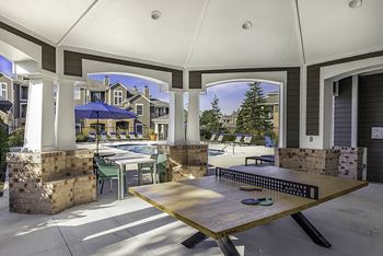 Poolside gazebo with ping-pong