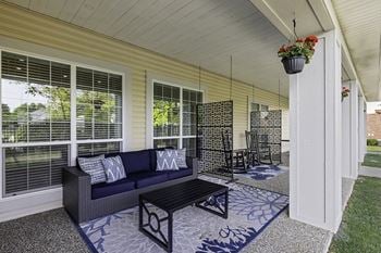 Patio with ping pong table and lounge area