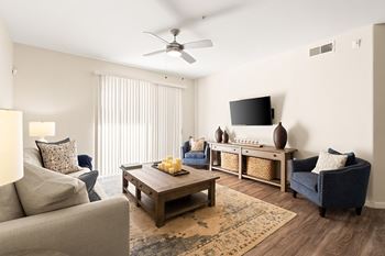Upgraded units with hardwood style flooring in living areas*
