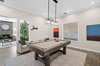 Clubhouse with fireside lounge, billiards table and widescreen television