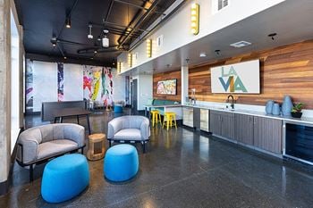 Kayaker's lounge with kombucha and kitchenette