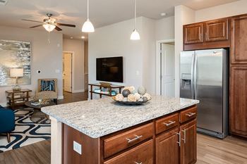 The haven at shoal creek refrigerator with side-by-side doors and an ice maker