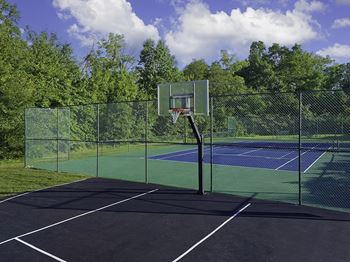 Sports court featuring tennis, basketball and pickelball
