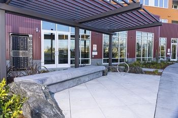 Bike plaza with bike racks and repair shop
