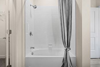 High-quality shower head with a removable bluetooth speaker in master bathroom