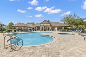 Wesley Chapel apartment for rent - Resort-style swimming pool with heated spa - Delano at Cypress Creek