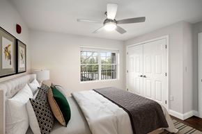 Bedford apartment for rent - Bedroom with lighted ceiling fan - Hampshire Green Apartments