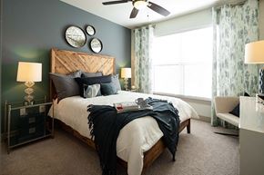 Alpharetta apartment for rent - The Juncture Apartments bedroom with ceiling fans