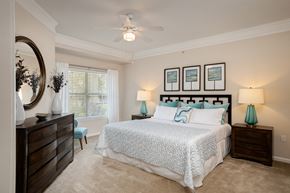 Kansas City apartment for rent - Carrington Place at Shoal Creek - Carpeted bedroom with ceiling fan