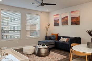 Two-inch faux-wood blinds on windows and patio doors