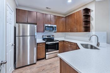 Stainless steel appliances in select units