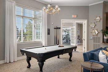 Resident lounge with billiards, large screen tv and coffee bar