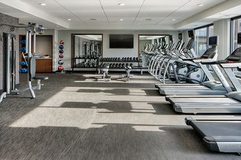 State-of-the-art fitness center with peloton bike