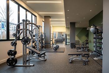 State-of-the-art fitness center with private workout pads, free weights and fitness on demand