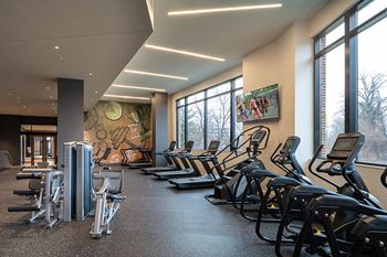 State-of-the-art fitness center with private workout pads, free weights and fitness on demand