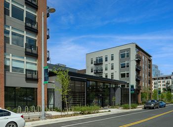 Grand entrance with park terrace and ground floor retail