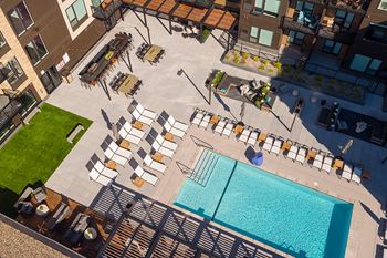 Outdoor resort-style pool with pool deck