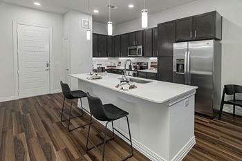 Side-by-side refrigerators with icemakers