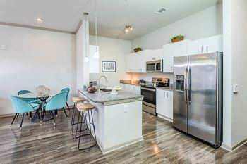 Energy-efficient stainless steel appliances with side-by-side refrigerators