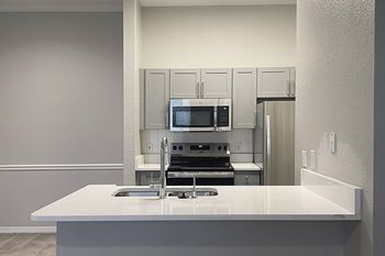 Upgraded countertops in kitchens and baths*