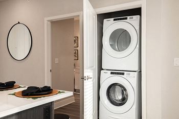 Full-sized stackable front-loading washer/dryers
