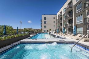 Castle Rock apartment for rent - a swimming pool with an apartment building in the background