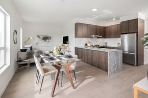 Colwood apartment for rent - a kitchen and dining room with a table and chairs